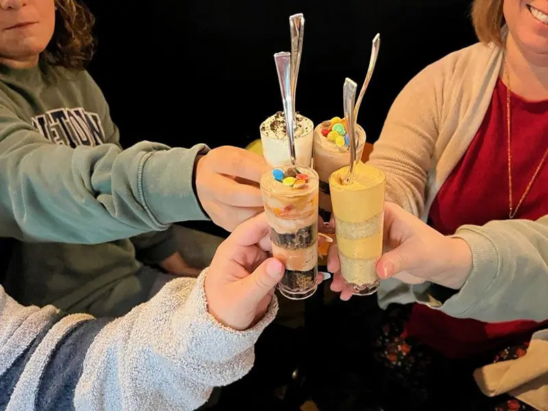 Friends enjoying Cheesecake Shots